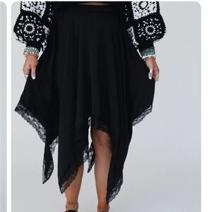 Three Bird Nest Black Handkerchief Hem Skirt  new w/ tags. It’s a “small medium”